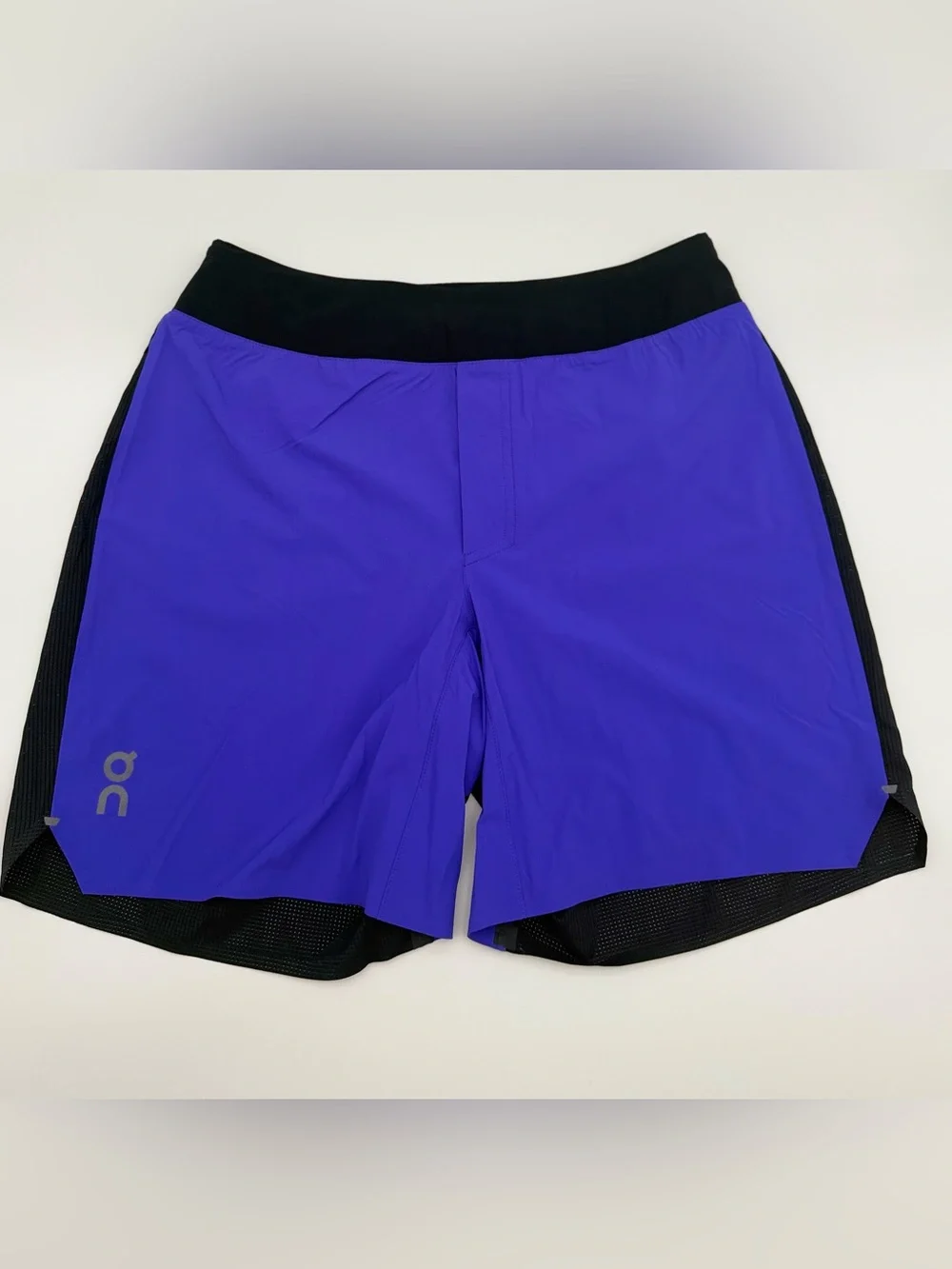 On Running Black Waistband blue and black Men Running Shorts size men’s Medium.